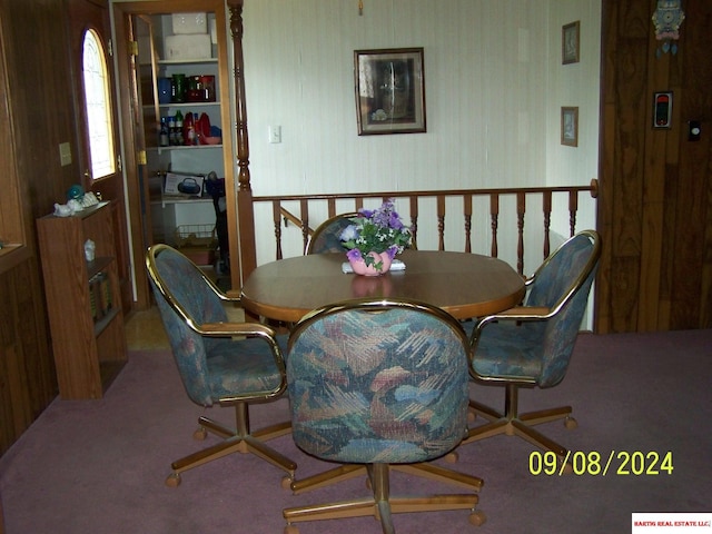 dining area featuring carpet flooring