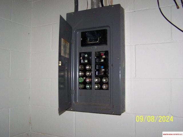 utility room featuring electric panel