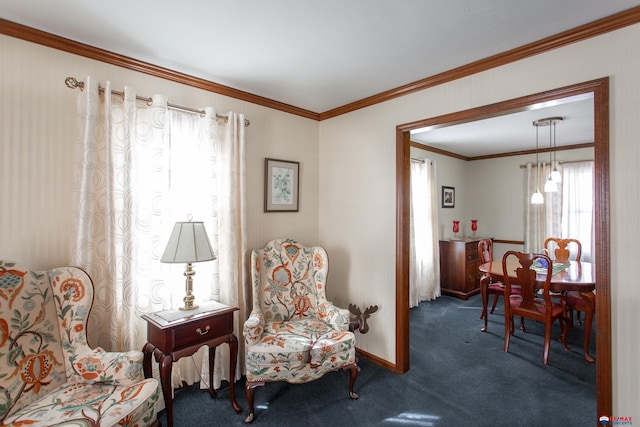 living area featuring dark carpet, baseboards, and ornamental molding