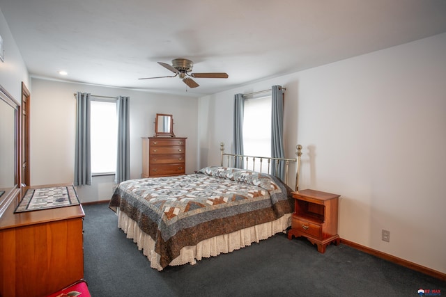 bedroom with baseboards, a ceiling fan, and carpet flooring