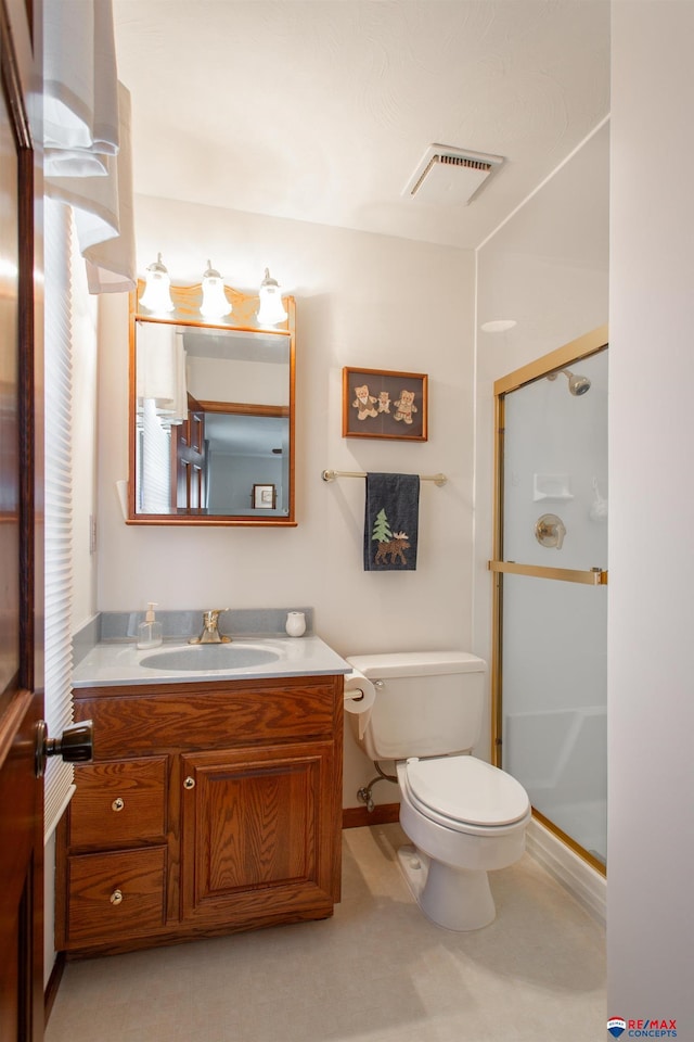 full bath featuring visible vents, a shower stall, vanity, and toilet