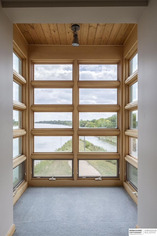 interior space featuring wooden ceiling