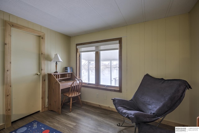 home office with wood finished floors