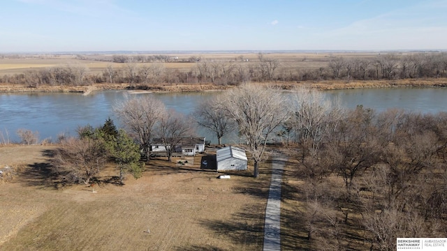 aerial view featuring a rural view and a water view