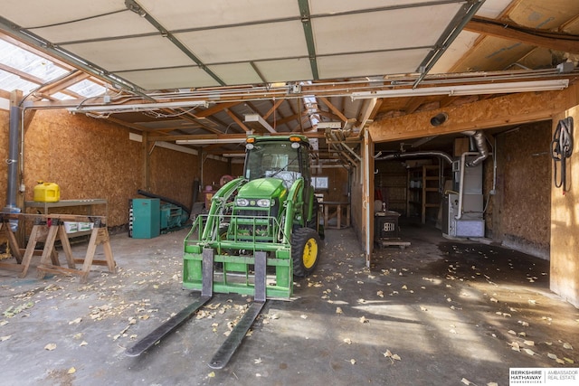 garage featuring heating unit