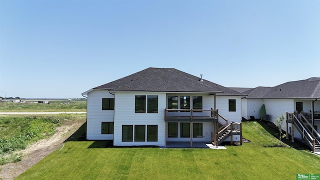 5816 N 198th St, Elkhorn, NE 68022 - back of house featuring stairway, a lawn, a deck, and a shingled roof