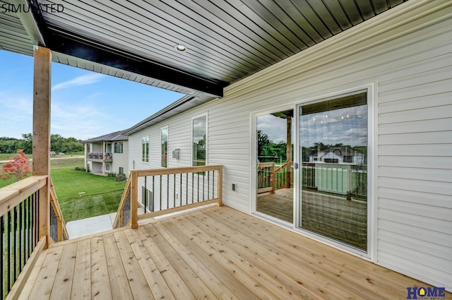 deck featuring a yard