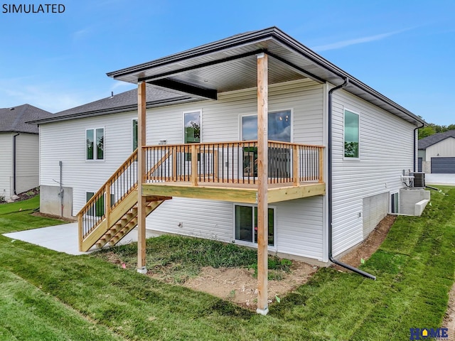 back of property featuring a yard, cooling unit, and stairway