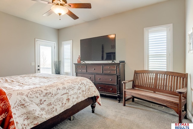 bedroom with carpet and a ceiling fan