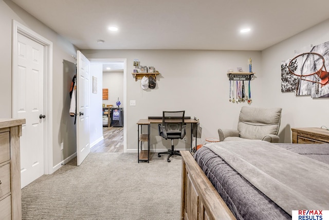 bedroom featuring light carpet, recessed lighting, and baseboards