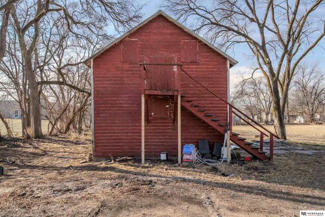 view of barn featuring stairs