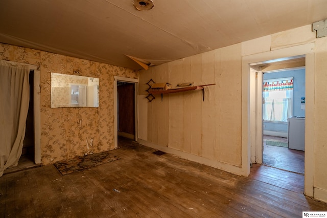 spare room featuring visible vents and wood-type flooring