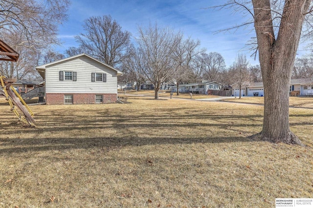 view of yard featuring a residential view