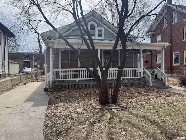 view of front of property featuring covered porch