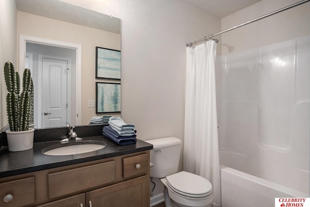 bathroom with vanity, toilet, and shower / bath combo