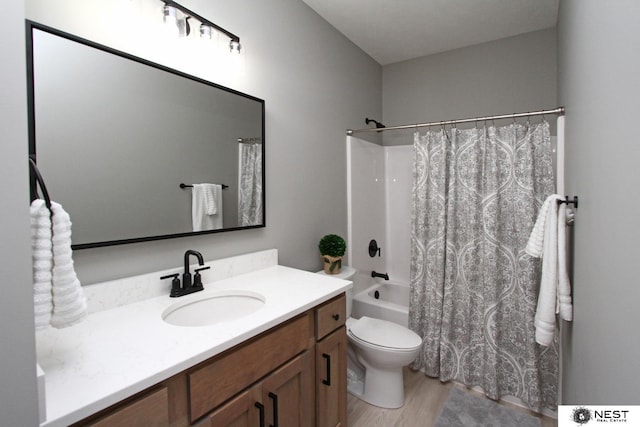 full bathroom with vanity, wood finished floors, toilet, and shower / bathtub combination with curtain