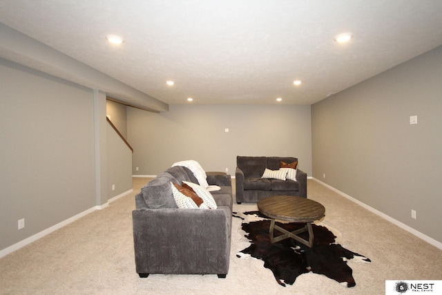 living room with recessed lighting, baseboards, and carpet floors