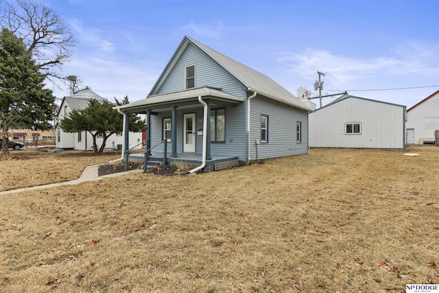 view of front of property with a porch and a front lawn