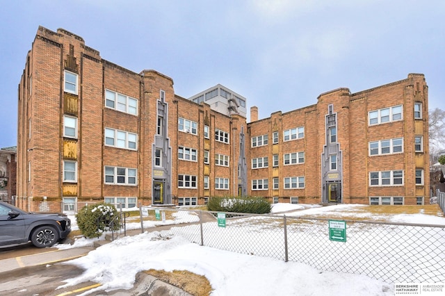 view of snow covered property