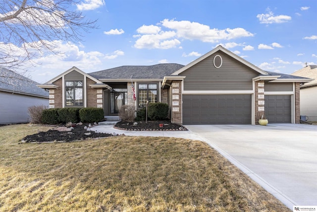 ranch-style home featuring brick siding, concrete driveway, a garage, and a front yard