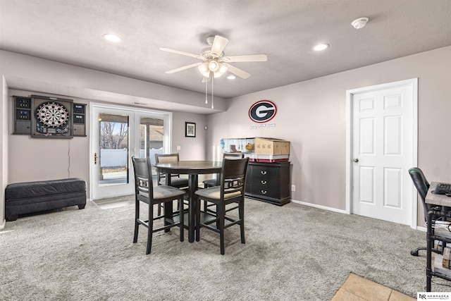 carpeted dining area with recessed lighting, french doors, baseboards, and ceiling fan