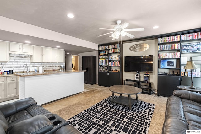 living room with recessed lighting and a ceiling fan