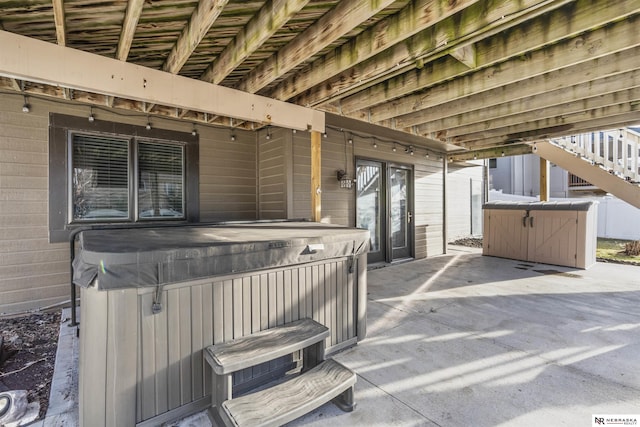 view of patio / terrace featuring a hot tub