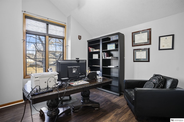 office with baseboards, lofted ceiling, and wood finished floors