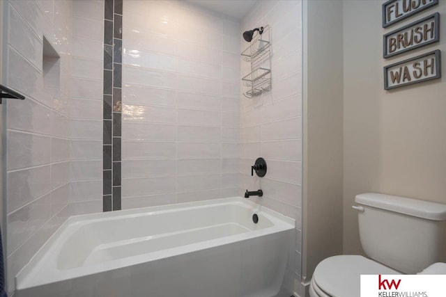 bathroom featuring toilet and  shower combination