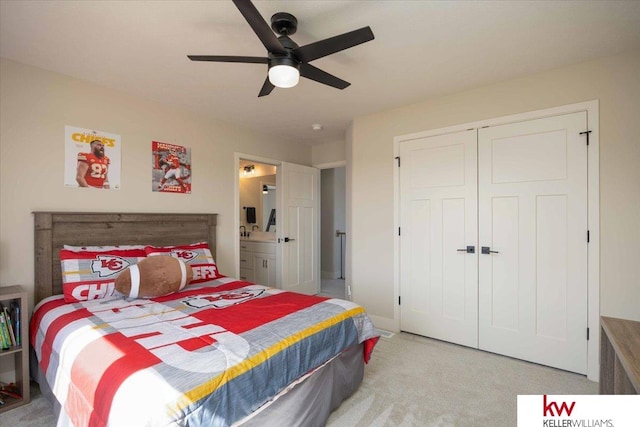 carpeted bedroom with a ceiling fan, a closet, and connected bathroom