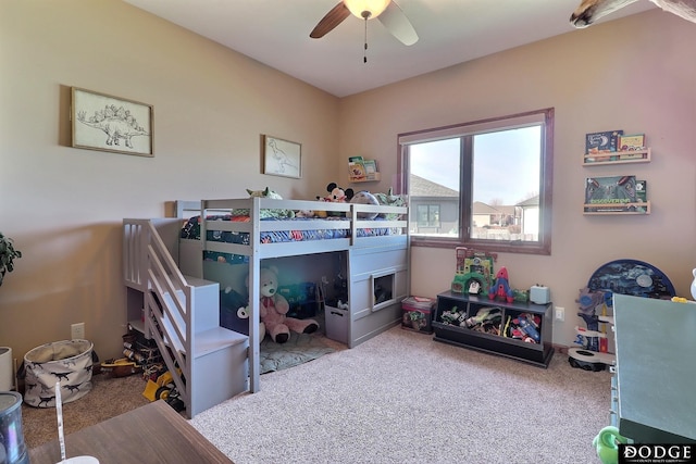 carpeted bedroom featuring ceiling fan