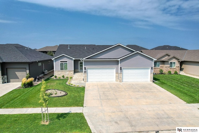 view of front of property featuring driveway, stone siding, roof with shingles, an attached garage, and a front yard