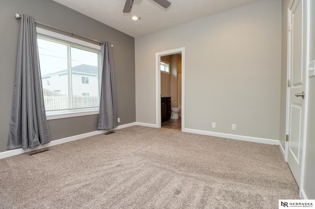 unfurnished bedroom featuring recessed lighting, baseboards, visible vents, and carpet floors