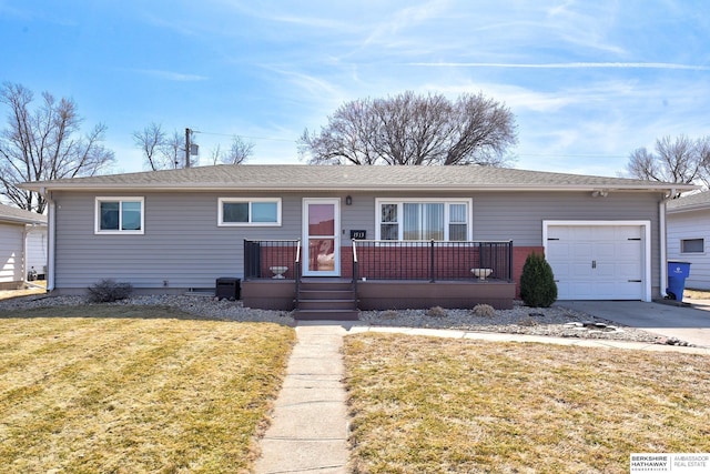 ranch-style home with a front yard, a garage, and driveway