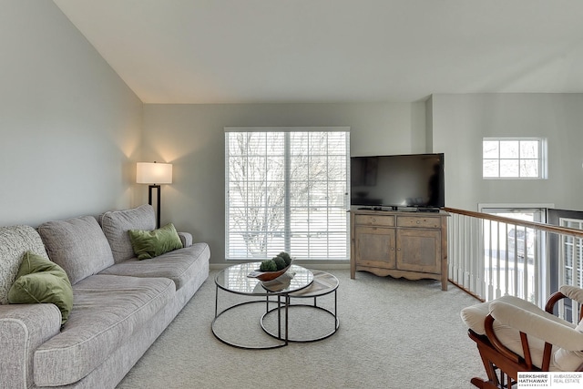 living area featuring light colored carpet