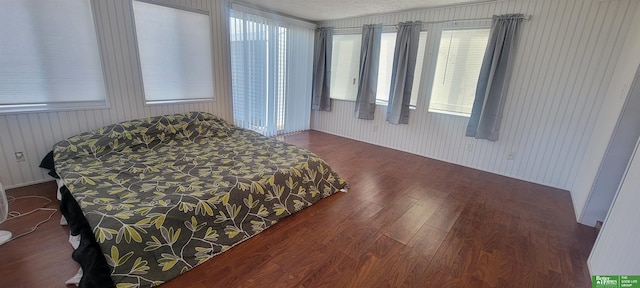 bedroom featuring wood finished floors