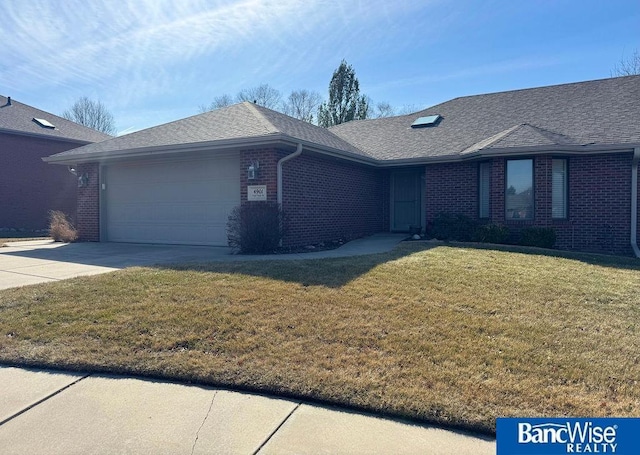 view of front of property featuring concrete driveway, a garage, brick siding, and a shingled roof