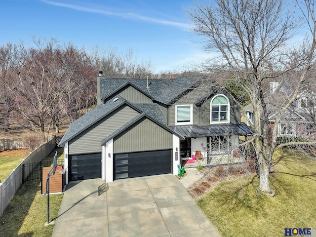 view of front of house featuring fence, covered porch, concrete driveway, a front yard, and a garage