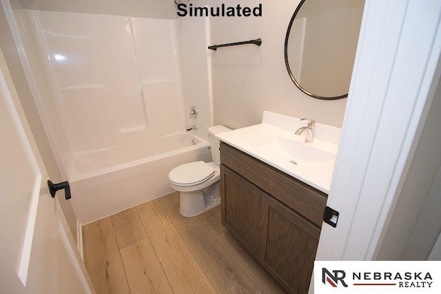 full bathroom featuring shower / bathtub combination, toilet, vanity, and wood finished floors