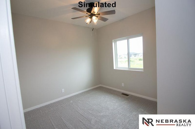 empty room featuring a ceiling fan, carpet, visible vents, and baseboards