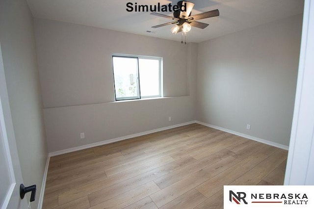 unfurnished room with baseboards, visible vents, a ceiling fan, and light wood-style floors