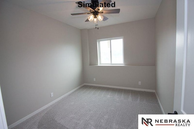 carpeted empty room with a ceiling fan and baseboards