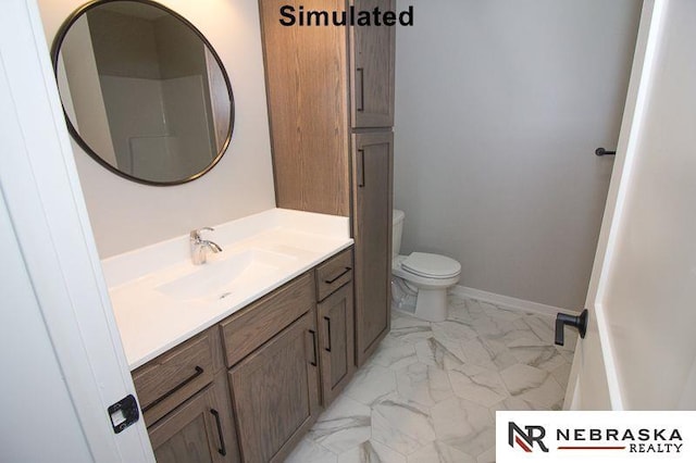 bathroom with baseboards, toilet, marble finish floor, and vanity