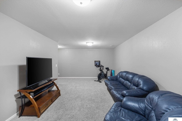 carpeted living room featuring a textured ceiling and baseboards