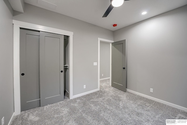 unfurnished bedroom featuring a closet, visible vents, baseboards, and carpet