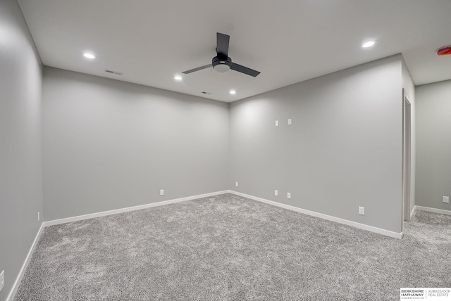 carpeted spare room with visible vents, recessed lighting, baseboards, and ceiling fan