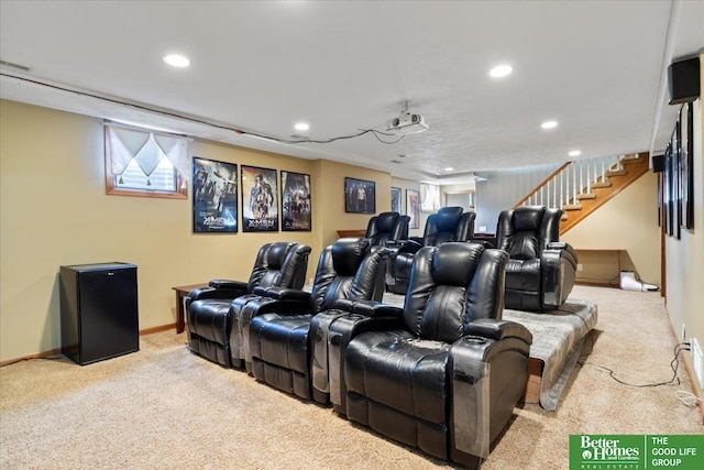 carpeted home theater featuring recessed lighting and baseboards