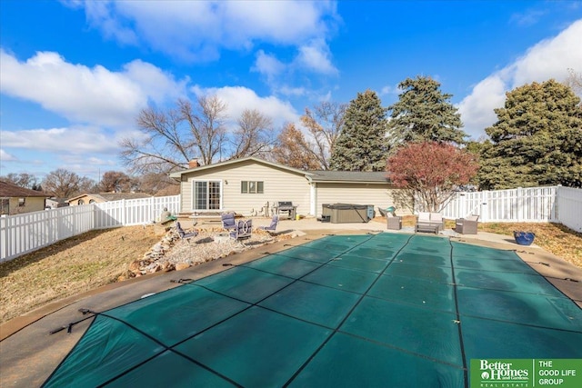 view of pool featuring a fenced in pool, a patio, and a fenced backyard