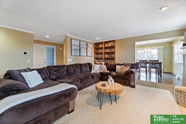 living room with recessed lighting, wood finished floors, and ornamental molding