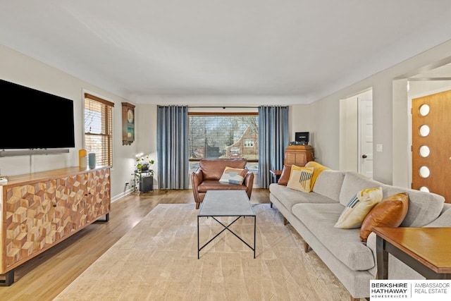 living room featuring light wood-style flooring